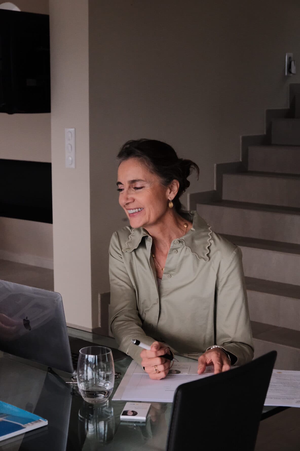 Working through a file at the agency's desk in Mougins